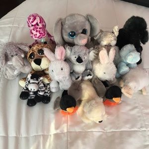 lot of webkinz and other stuffed animals